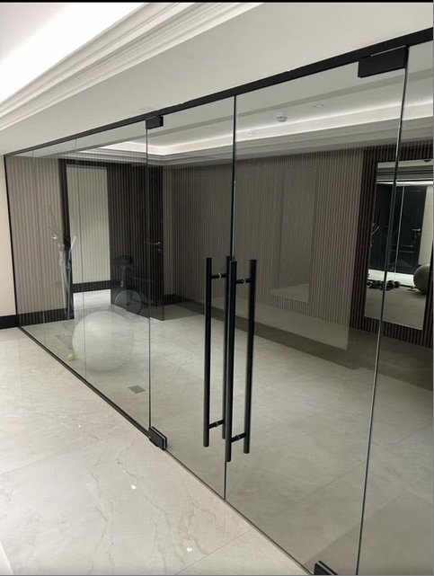 Floor to ceiling glass partition Manchester commercial